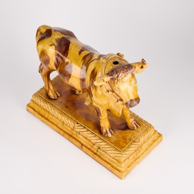 Lot 44 - A LARGE PORTUGUESE POTTERY FLASK IN THE FORM OF A BULL, 19TH CENTURY