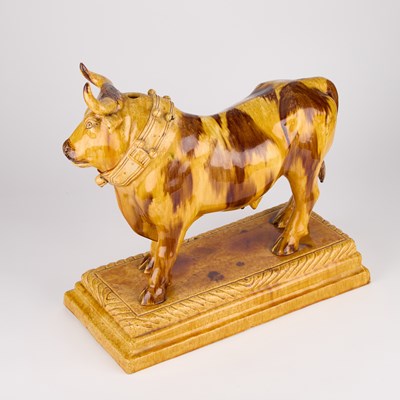 Lot 44 - A LARGE PORTUGUESE POTTERY FLASK IN THE FORM OF A BULL, 19TH CENTURY