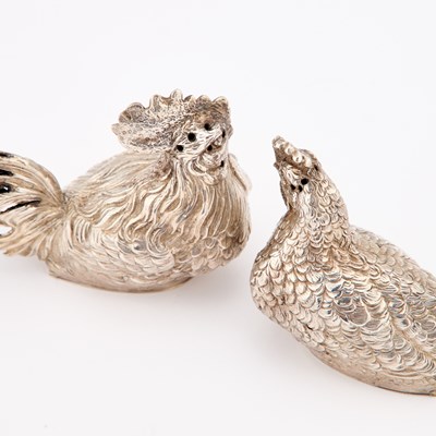 Lot 193 - A PAIR OF FRENCH SILVER 'CHICKEN' PEPPERS