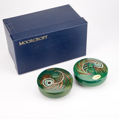 Lot 63 - A PAIR OF MOORCROFT POTTERY POWDER BOWLS AND COVERS, DESIGNED BY SALLY TUFFIN FOR LIBERTY & CO