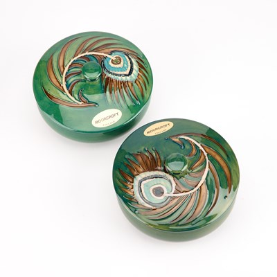 Lot 63 - A PAIR OF MOORCROFT POTTERY POWDER BOWLS AND COVERS, DESIGNED BY SALLY TUFFIN FOR LIBERTY & CO