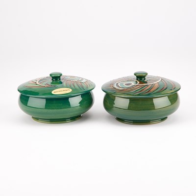 Lot 63 - A PAIR OF MOORCROFT POTTERY POWDER BOWLS AND COVERS, DESIGNED BY SALLY TUFFIN FOR LIBERTY & CO