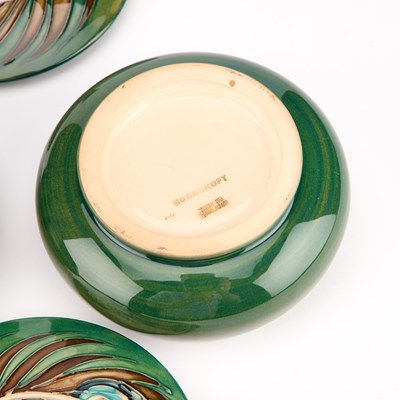 Lot 63 - A PAIR OF MOORCROFT POTTERY POWDER BOWLS AND COVERS, DESIGNED BY SALLY TUFFIN FOR LIBERTY & CO