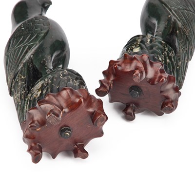 Lot 1005 - A PAIR OF CHINESE SPINACH GREEN JADE MODELS OF BIRDS