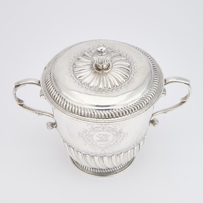 Lot 479 - A WILLIAM III SILVER TWIN-HANDLED PORRINGER AND COVER