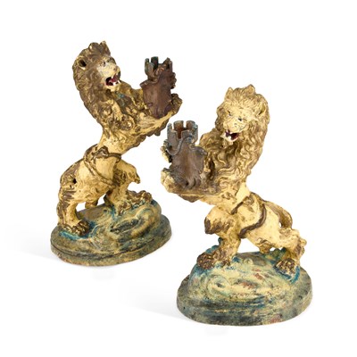 Lot 20 - A PAIR OF 19TH CENTURY PAINTED TERRACOTTA MODELS OF LIONS RAMPANT