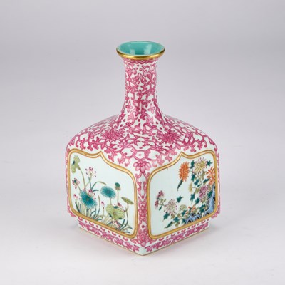 Lot 63 - A CHINESE PUCE-DECORATED FAMILLE ROSE VASE