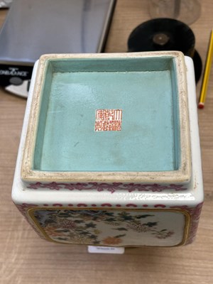 Lot 63 - A CHINESE PUCE-DECORATED FAMILLE ROSE VASE
