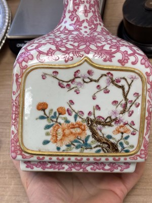 Lot 63 - A CHINESE PUCE-DECORATED FAMILLE ROSE VASE