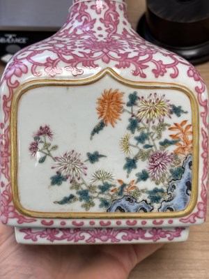 Lot 63 - A CHINESE PUCE-DECORATED FAMILLE ROSE VASE