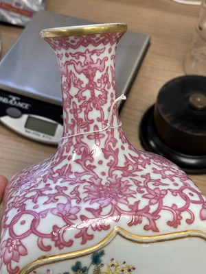 Lot 63 - A CHINESE PUCE-DECORATED FAMILLE ROSE VASE