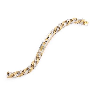 Lot 482 - A 9 CARAT BI-COLOUR GOLD TEXTURED IDENTITY BRACELET