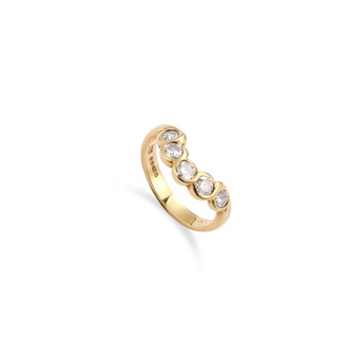 Lot 603 - AN 18 CARAT GOLD FIVE STONE ROUND BRILLIANT-CUT DIAMOND HALF HOOP RING