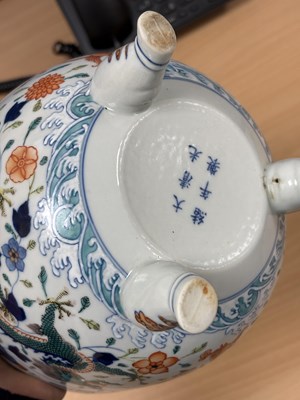 Lot 113 - A CHINESE PORCELAIN DOUCAI DECORATED TWO-HANDLED TRIPOD CENSER