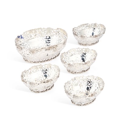 Lot 470 - A SET OF FIVE VICTORIAN SILVER TABLE BASKETS