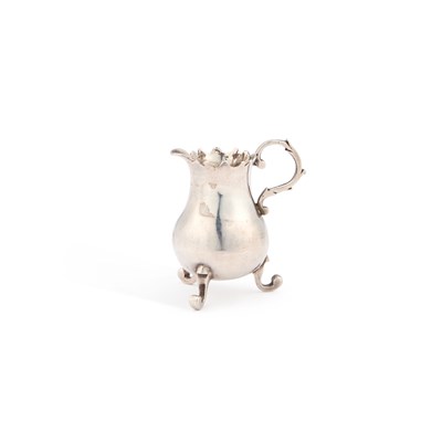 Lot 135 - AN 18TH CENTURY DUTCH SILVER MINIATURE JUG