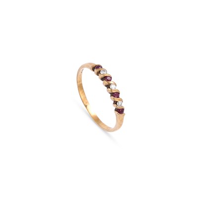 Lot 609 - A 9 CARAT GOLD RUBY AND DIAMOND HALF HOOP RING