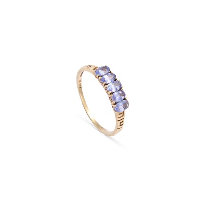Lot 674 - A 9 CARAT GOLD TANZANITE FIVE STONE RING