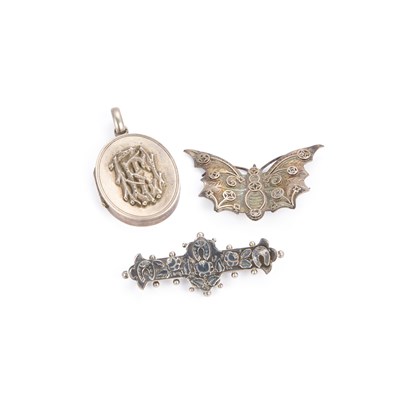 Lot 706 - TWO VICTORIAN AESTHETIC MOVEMENT BROOCHES AND A LOCKET PENDANT