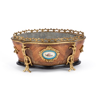 Lot 910 - A LOUIS XV STYLE GILT-METAL MOUNTED KINGWOOD JARDINIÈRE WITH SÈVRES-STYLE PORCELAIN PANELS