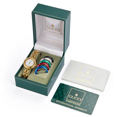 Lot 544 - A LADY'S GOLD PLATED GUCCI BRACELET WATCH