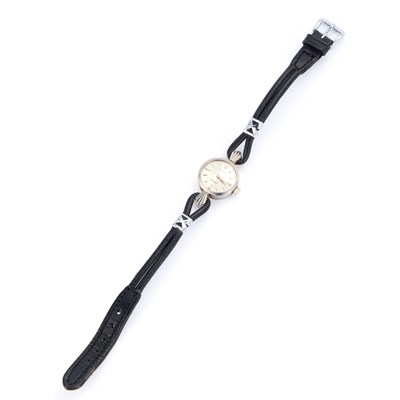 Lot 558 - A LADY'S 18CT WHITE GOLD ROLEX ORCHID STRAP WATCH