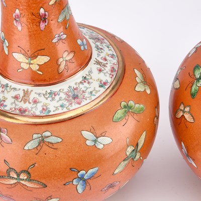 Lot 131 - A PAIR OF CHINESE FAMILLE ROSE 'BUTTERFLY' VASES