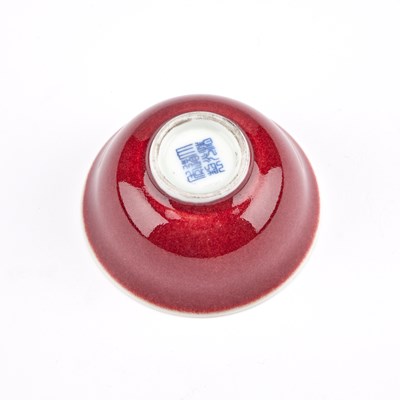 Lot 105 - A SMALL CHINESE OX-BLOOD PORCELAIN BOWL