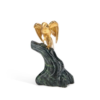 Lot 456 - AN AESTHETIC MOVEMENT SILVER-GILT MUG