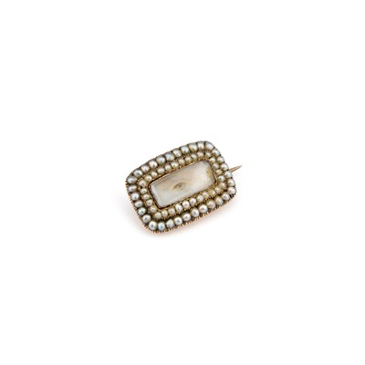 Lot 571 - A GEORGIAN LOVER'S EYE PORTRAIT MINIATURE BROOCH