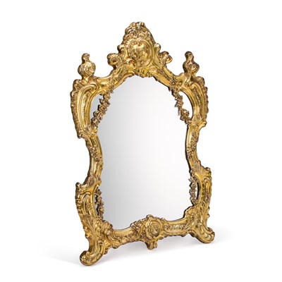 Lot 106 - AN 18TH CENTURY GERMAN ROCOCO SILVER-GILT DRESSING TABLE MIRROR