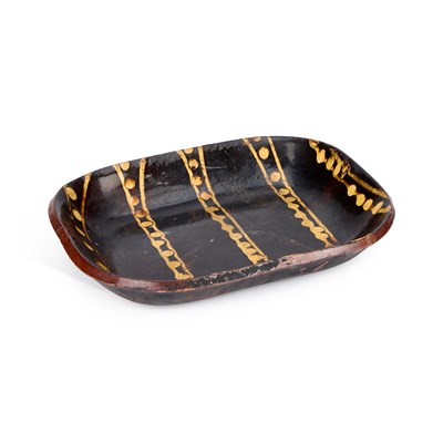 Lot 95 - A BUCKLEY POTTERY SLIPWARE BAKING DISH