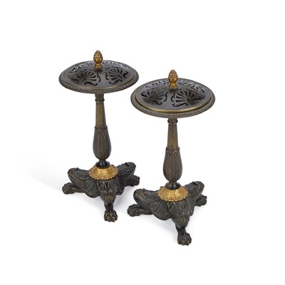 Lot 235 - A PAIR OF 19TH CENTURY FRENCH PATINATED AND PARCEL-GILT BRONZE POTPOURRI STANDS AND COVERS