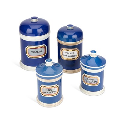 Lot 50 - A GROUP OF FOUR BLUE-GLAZED PHARMACY JARS