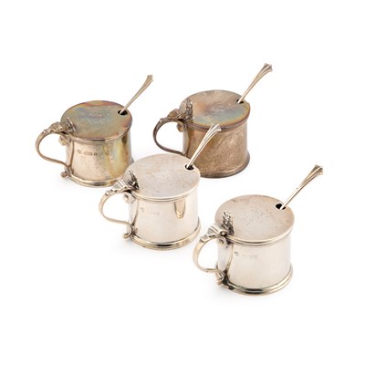 Lot 674 - FOUR GEORGE V SILVER MUSTARD POTS