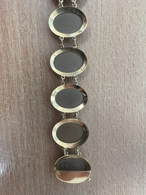 Lot 974 - AN ANTIQUE STYLE ITALIAN LAVA CAMEO BRACELET