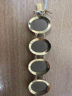 Lot 974 - AN ANTIQUE STYLE ITALIAN LAVA CAMEO BRACELET