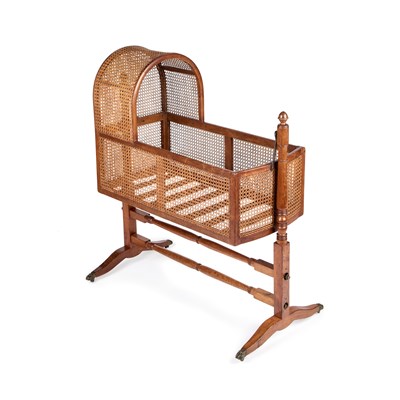 Lot 450 - A 19TH CENTURY MAHOGANY AND CANEWORK CRADLE