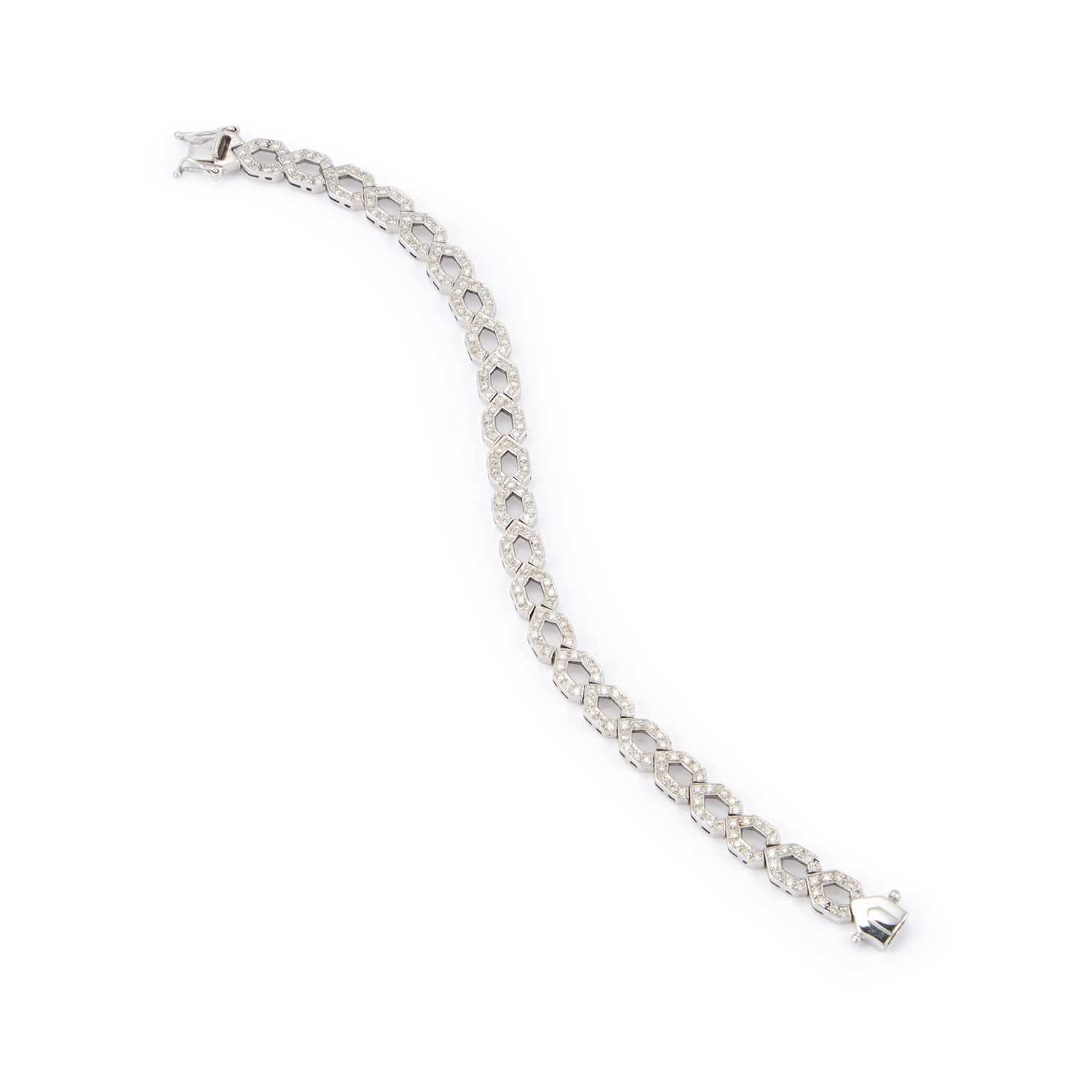 Lot 945 - A DIAMOND BRACELET