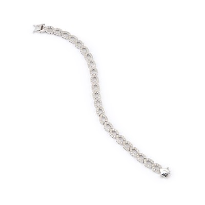Lot 945 - A DIAMOND BRACELET