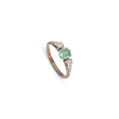 Lot 1023 - A THREE STONE BLUE ZIRCON AND DIAMOND RING