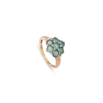 Lot 876 - A BLUE-GREEN TOPAZ AND DIAMOND CLUSTER RING