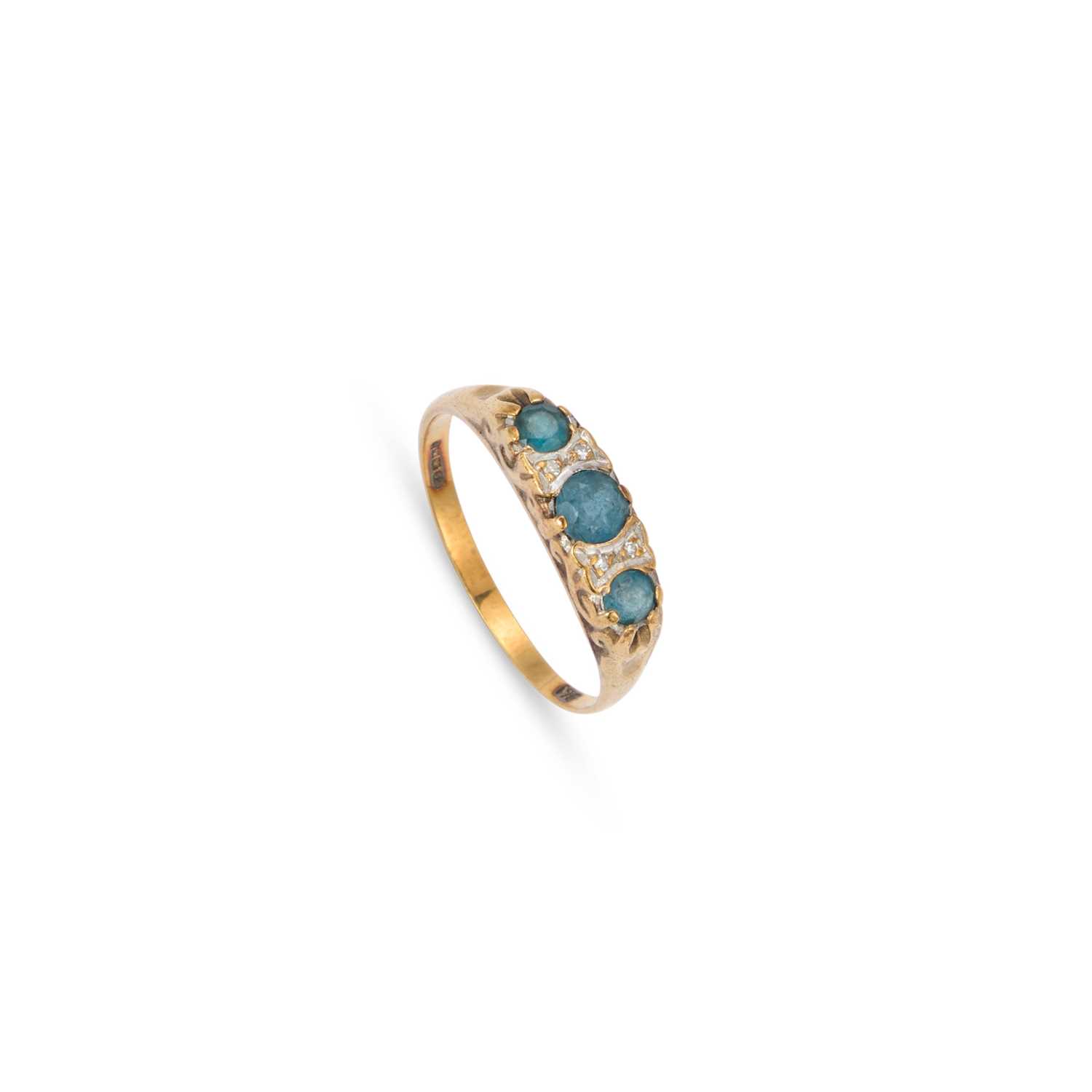 Lot 899 - A 9 CARAT GOLD BLUE SPINEL AND DIAMOND RING