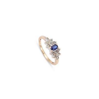Lot 869 - A 9 CARAT GOLD SAPPHIRE AND DIAMOND CLUSTER RING