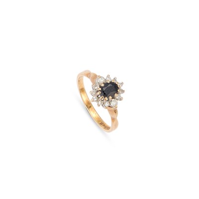 Lot 872 - A 9 CARAT GOLD SAPPHIRE AND DIAMOND CLUSTER RING