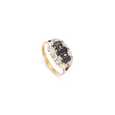 Lot 531 - A 9 CARAT GOLD SAPPHIRE AND DIAMOND RING