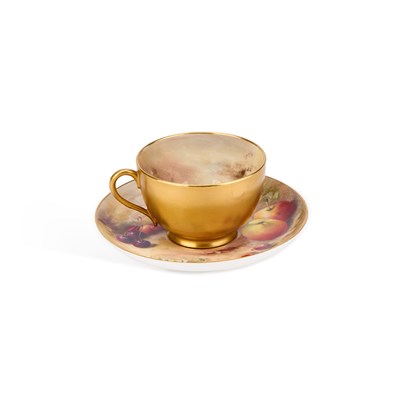 Lot 129 - A ROYAL WAORCESTER FRUIT PAINTED CUP AND SAUCER