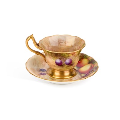 Lot 134 - A ROYAL WORCESTER FRUIT PAINTED CUP AND SAUCER