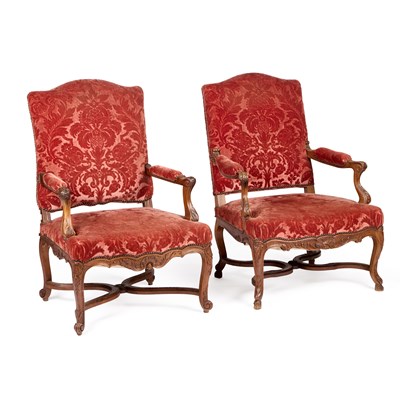 Lot 454 - A NEAR PAIR OF FRENCH WALNUT AND UPHOLSTERED OPEN ARMCHAIRS