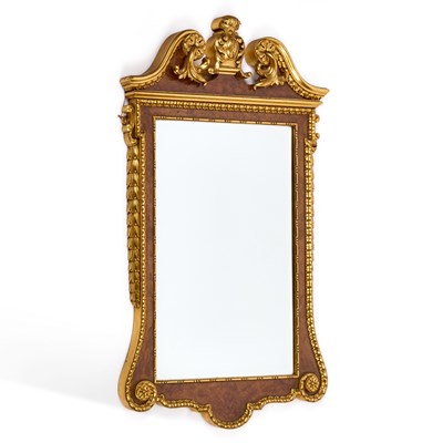 Lot 465 - A PARCEL-GILT WALNUT MIRROR